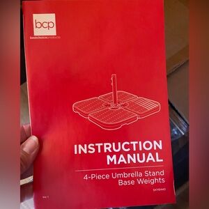 NEW in box bc 4-piece umbrella stand base weights. Fill with water or sand.